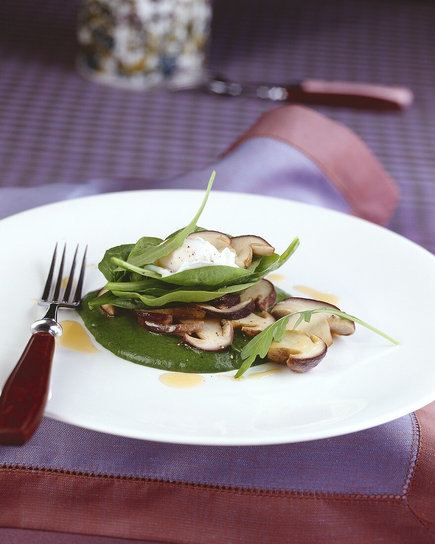 Sautéed ceps with spinach and poached egg