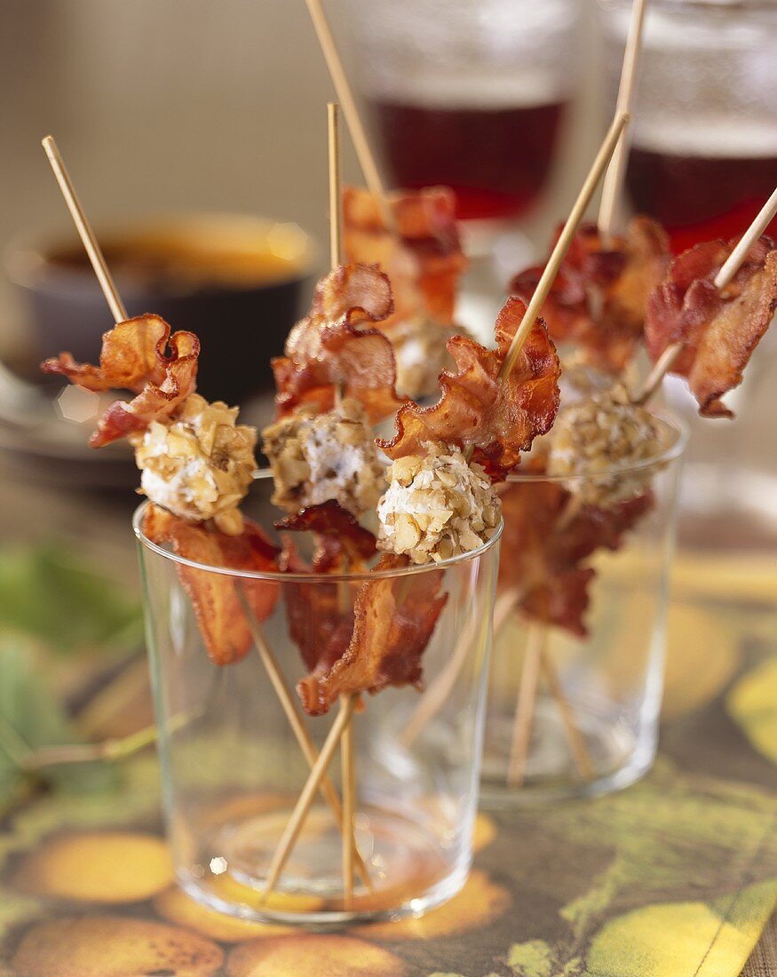 Bacon and grape skewers with soft cheese and nuts