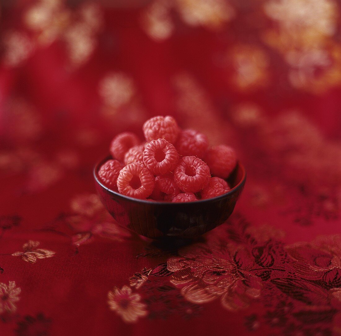 A small bowl of raspberries