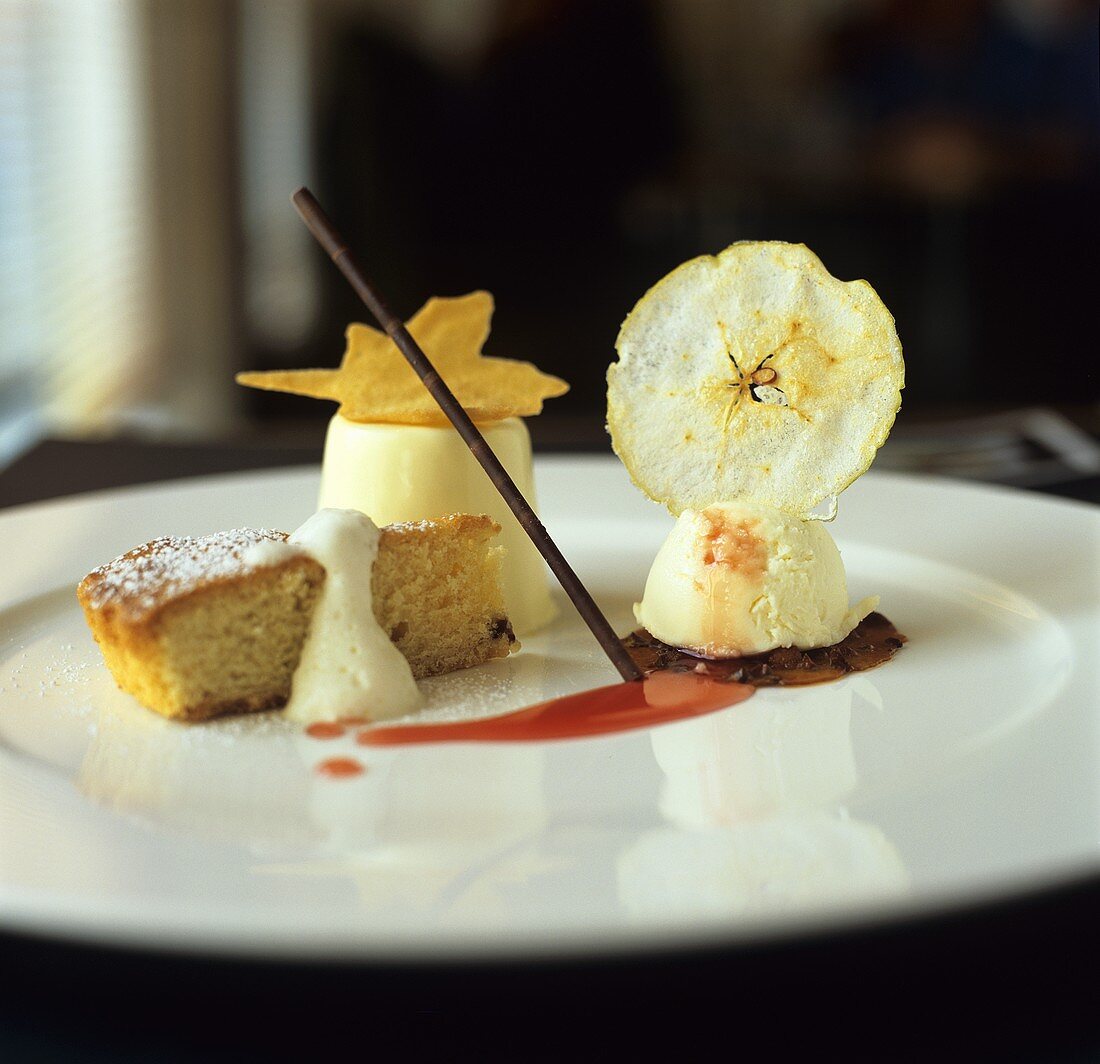 Dessert assiette: cake, panna cotta and apple ice cream