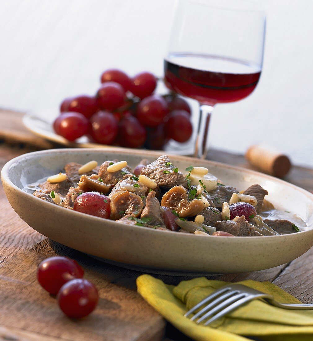 Lamb stew with red grapes, figs and honey