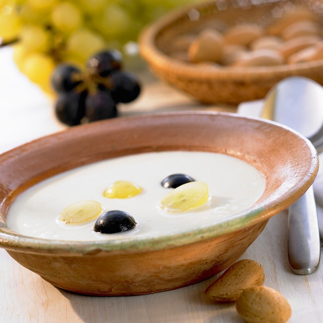 Cold almond soup with grapes