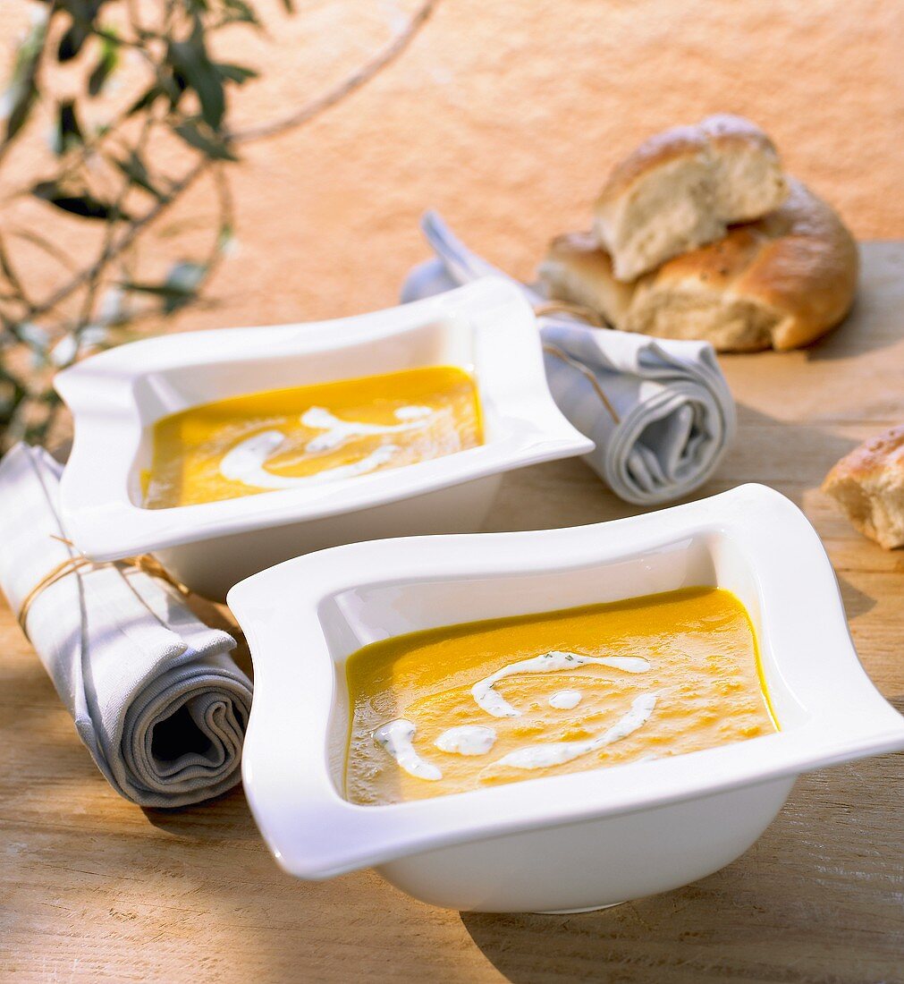 Carrot soup with herb and ginger yoghurt