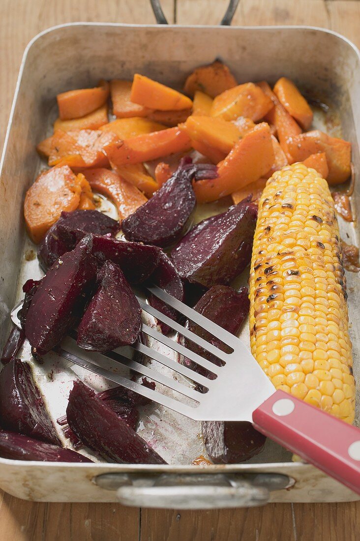 Oven-roasted beetroot, pumpkin and corn on the cob
