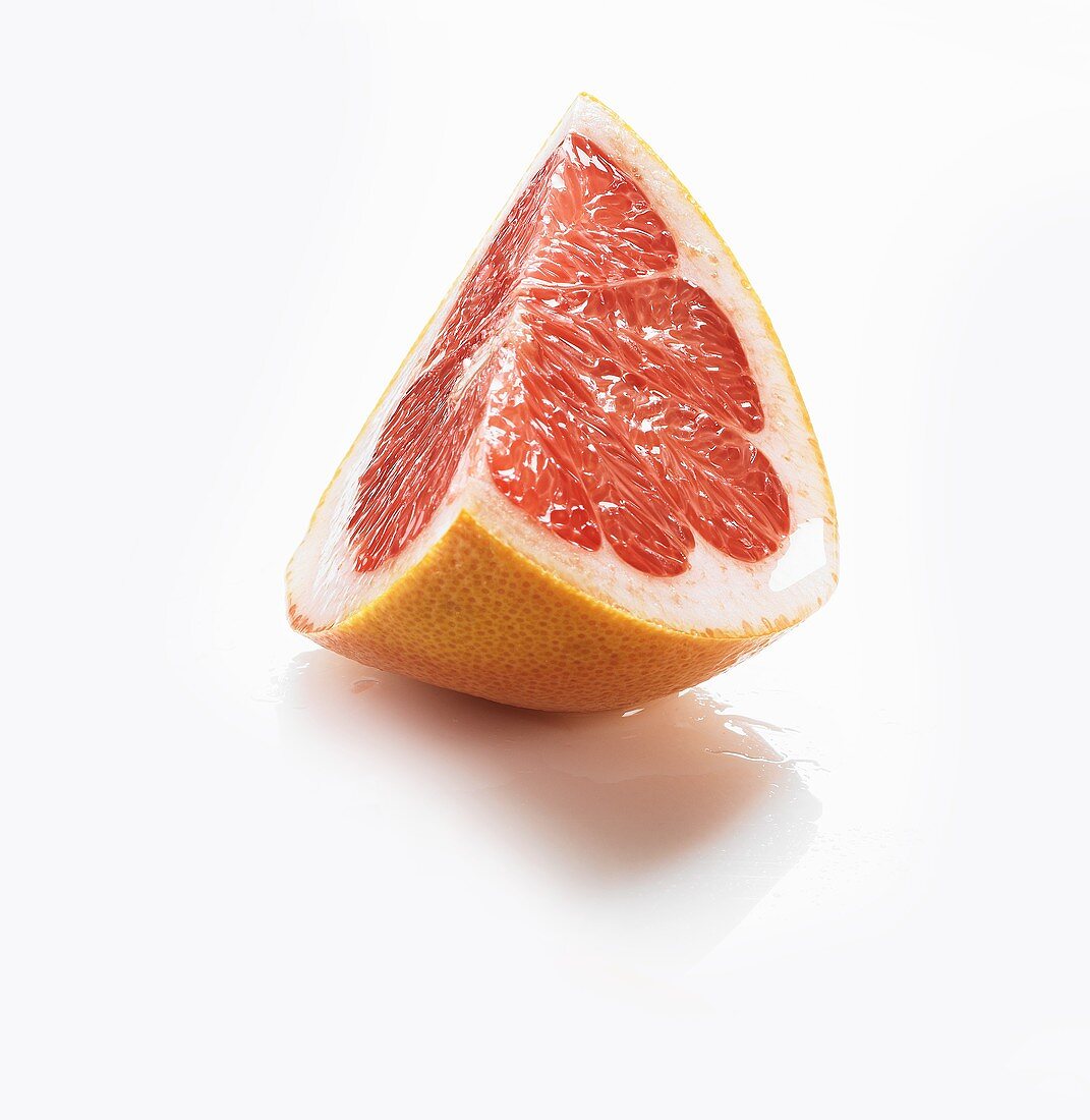 Wedge of pink grapefruit