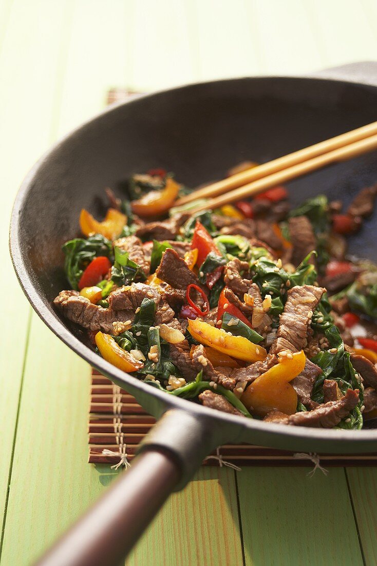 Stir-fried beef with ramsons (wild garlic) and peppers