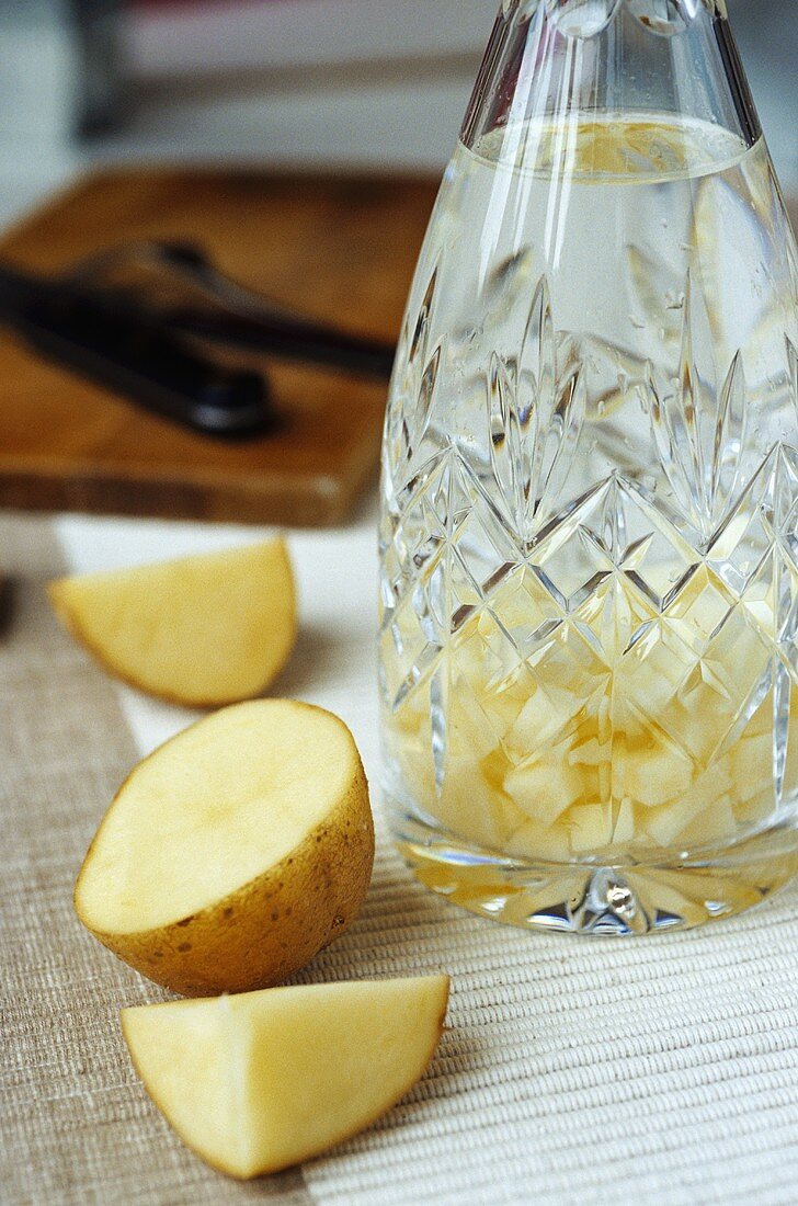 Potato in water, old household remedy for cleaning a carpet