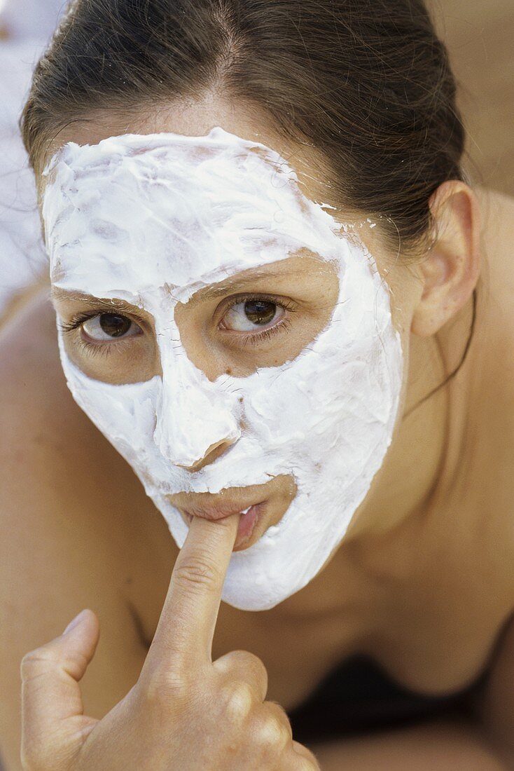 Young woman with face mask