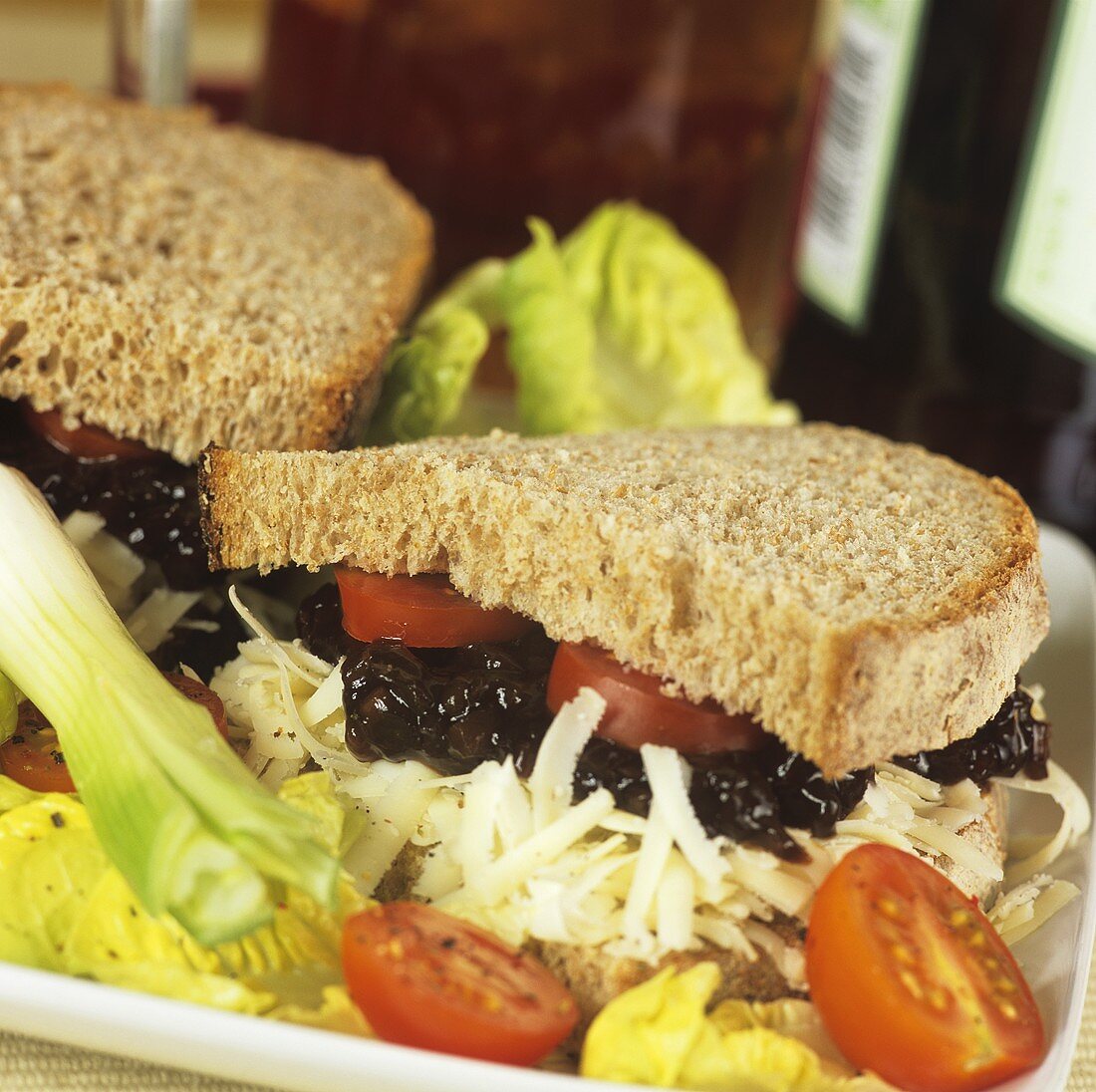 Cheese, tomato and chutney sandwiches with salad