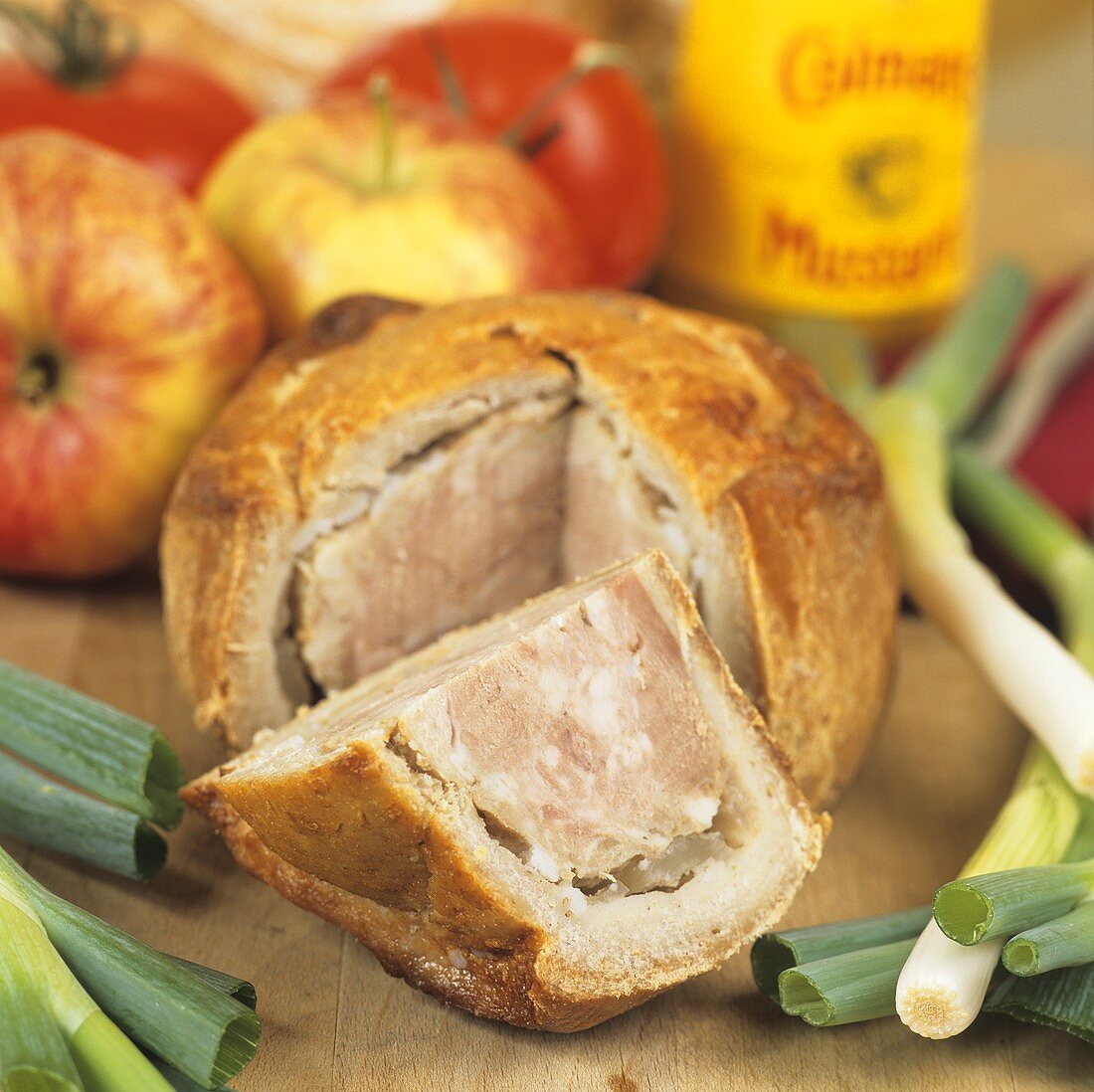 Pork pie, a piece cut (UK)