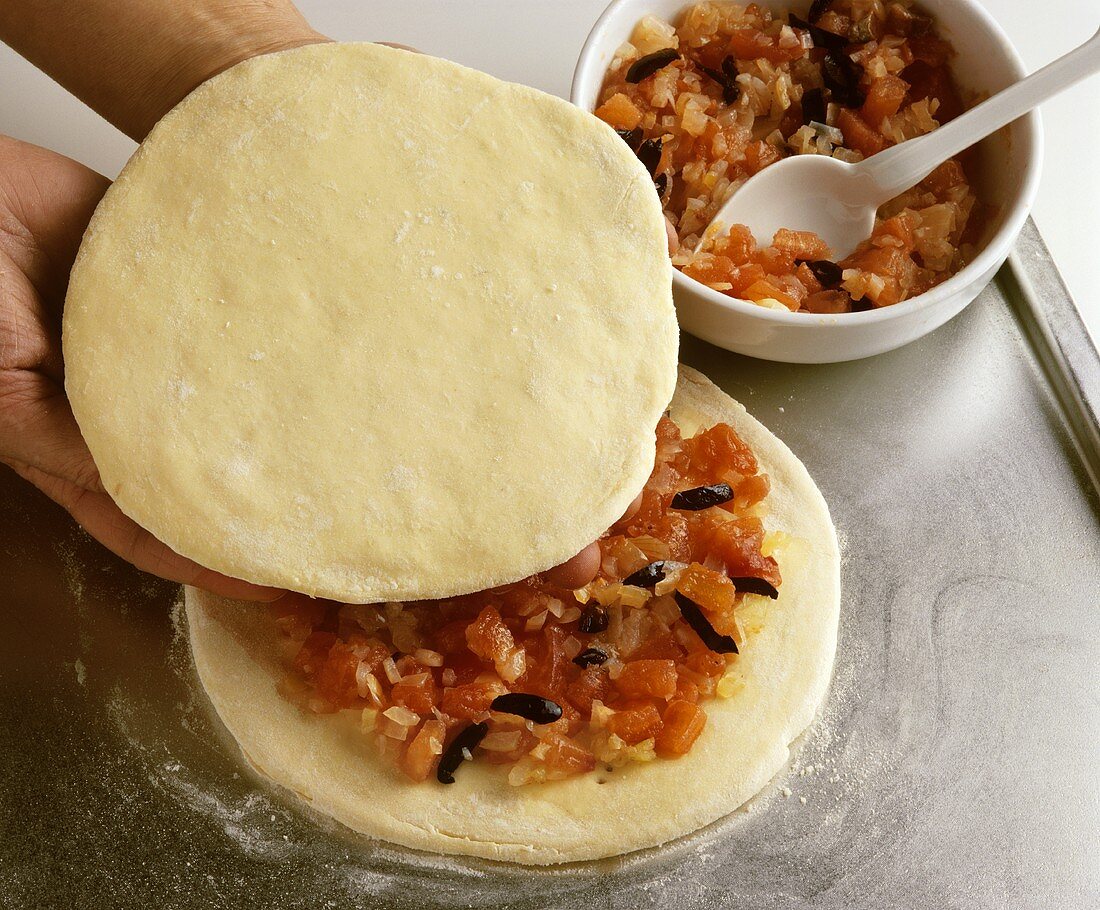 Focaccia mit Tomaten zubereiten