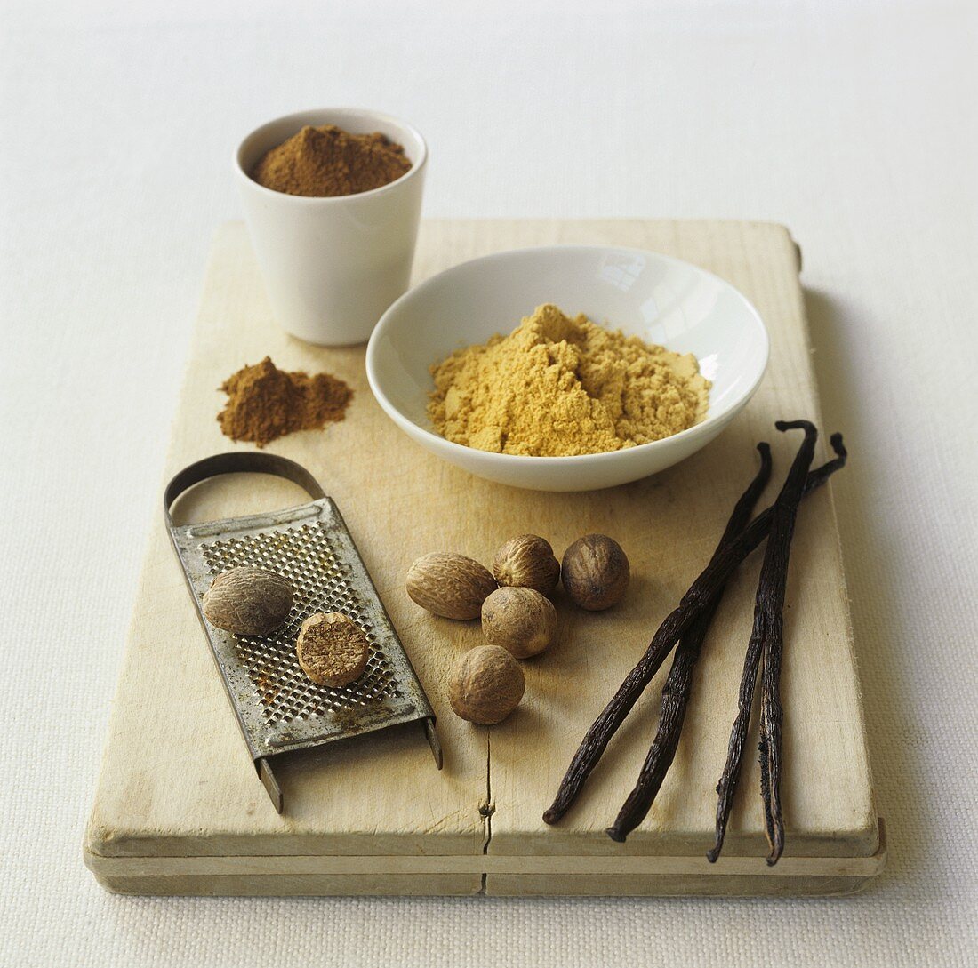 Nutmegs, vanilla pods, ground ginger and cinnamon