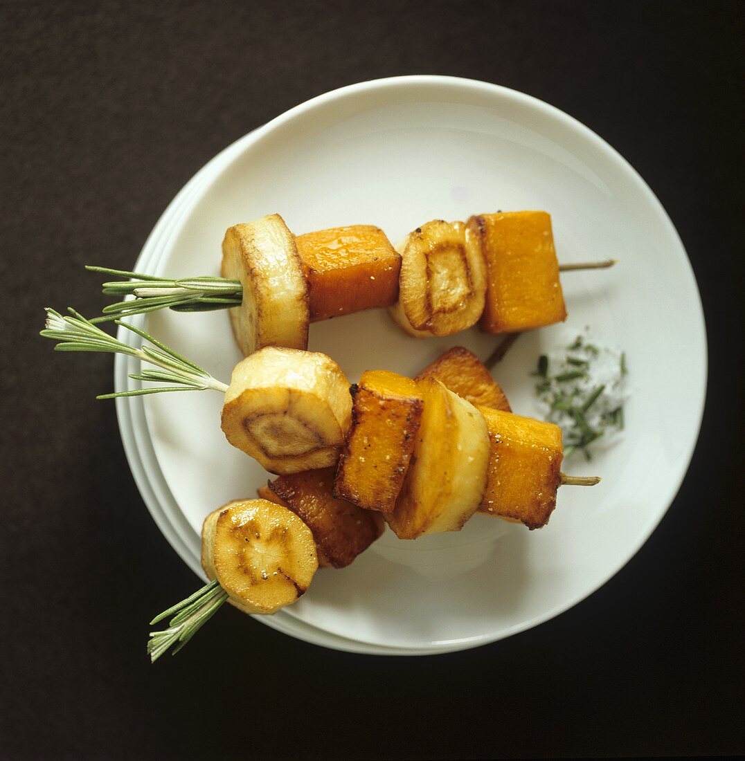 Baked sweet potato and parsnip on rosemary skewers