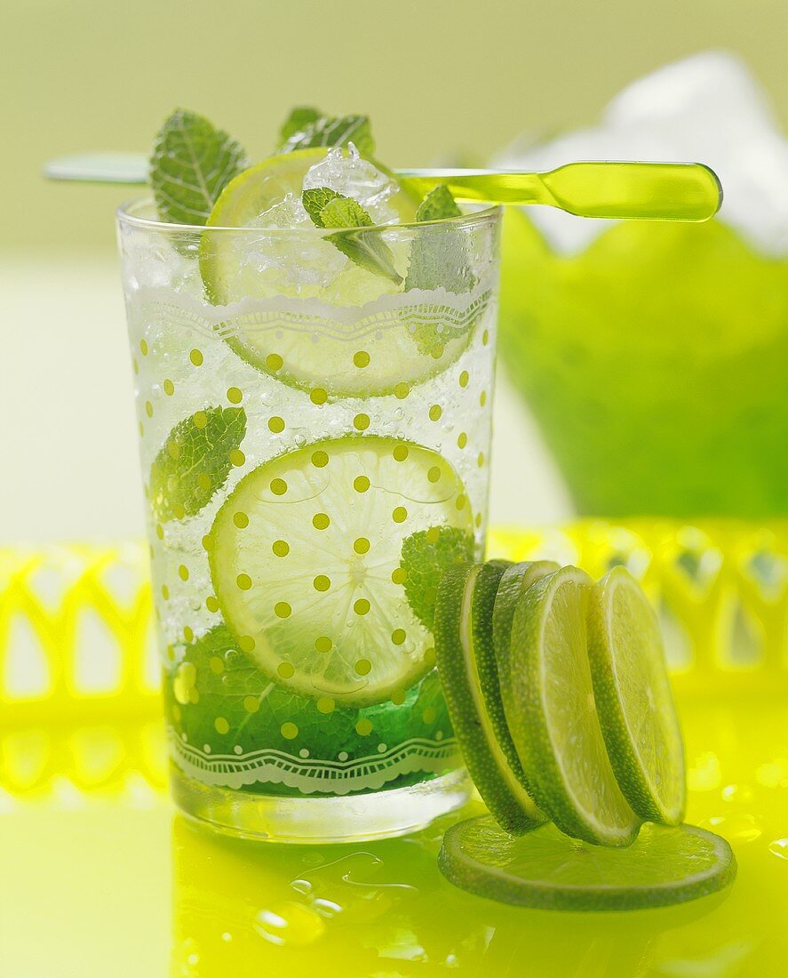 A glass of mint and lime drink