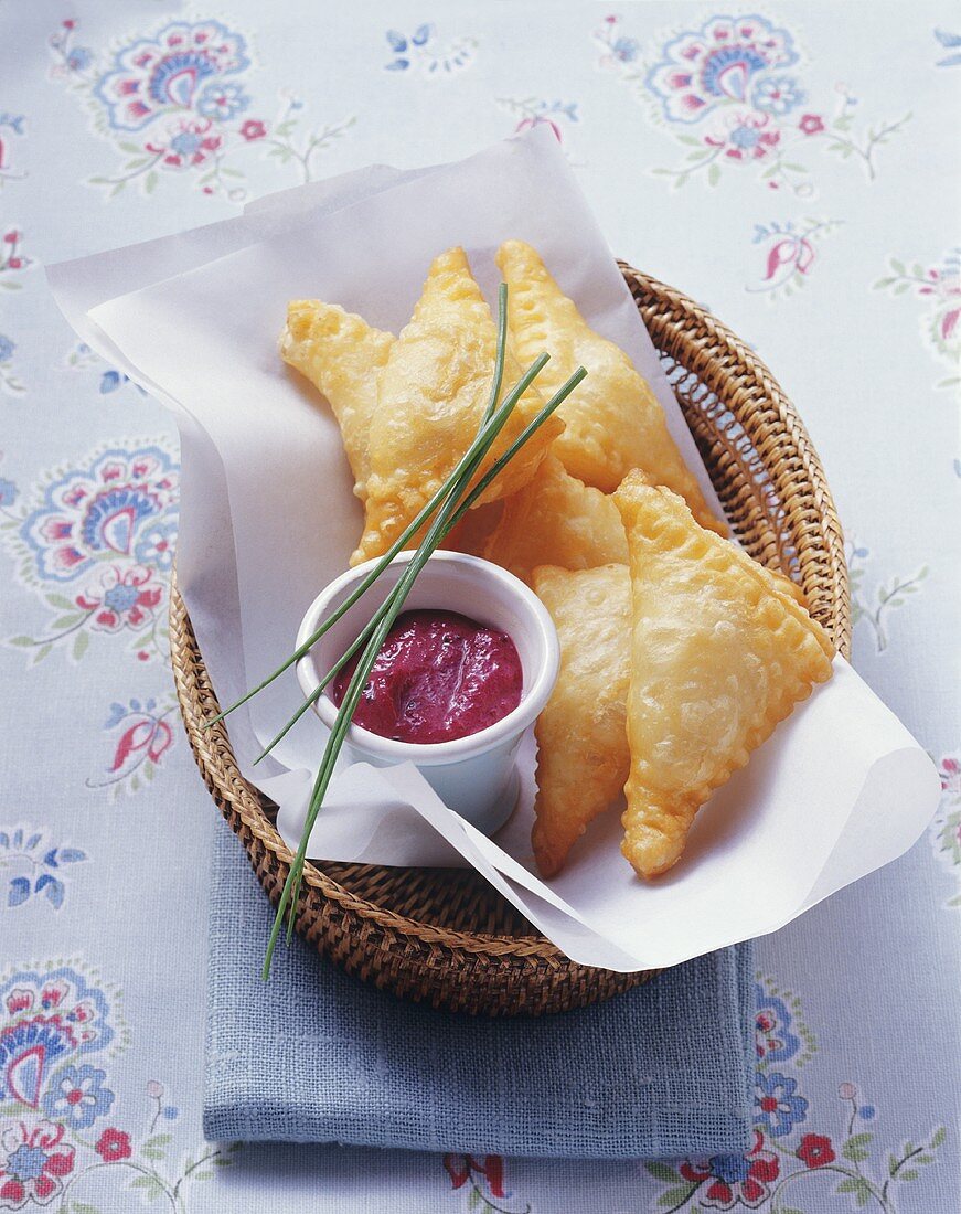 Puff pastry triangles with sauerkraut filling & beetroot dip