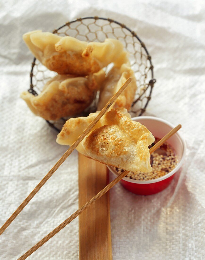 Fried jiaozi (Filled dumplings, China)