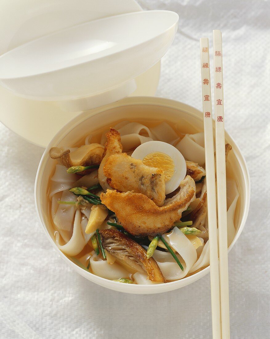 Rice noodle soup with catfish and bamboo