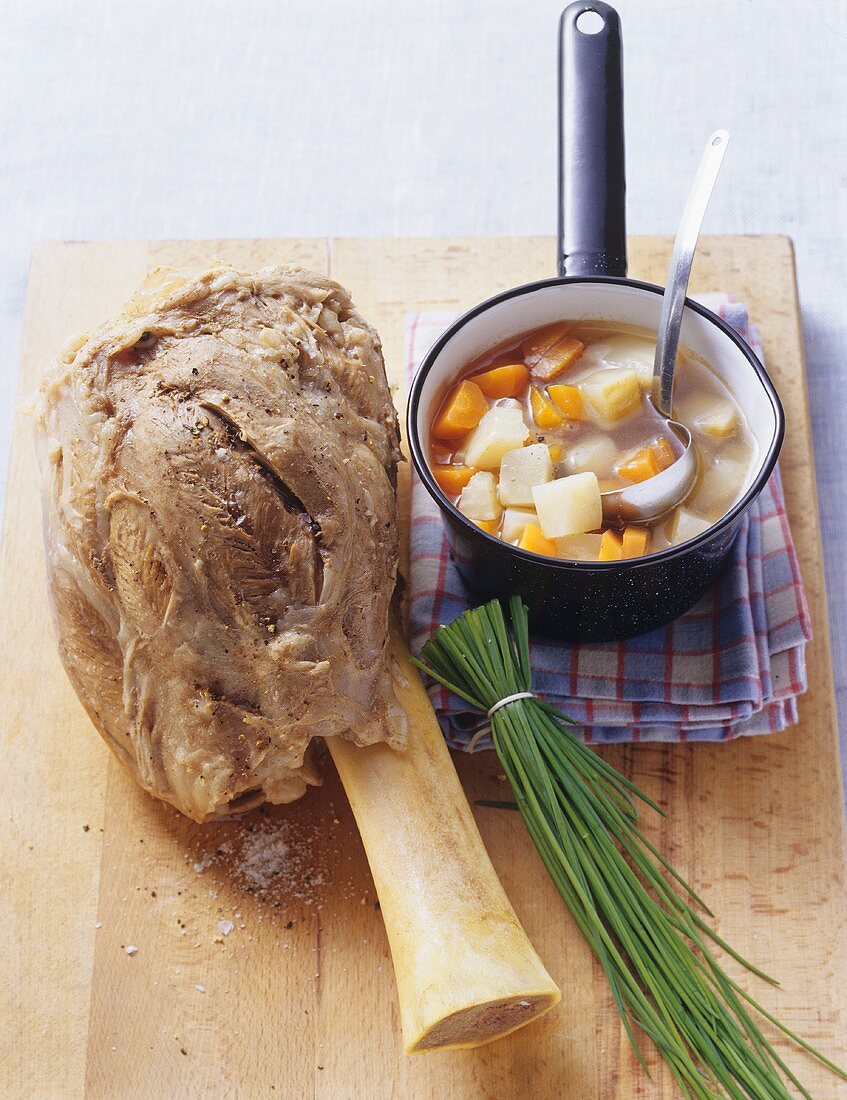 Boiled veal shank with carrot and celeriac broth