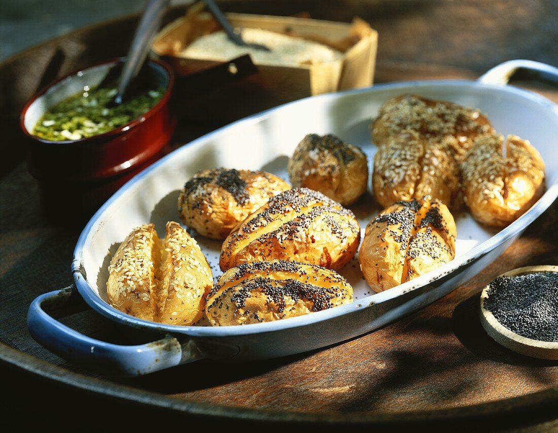 Oven-baked potatoes with poppy seeds and sesame seeds