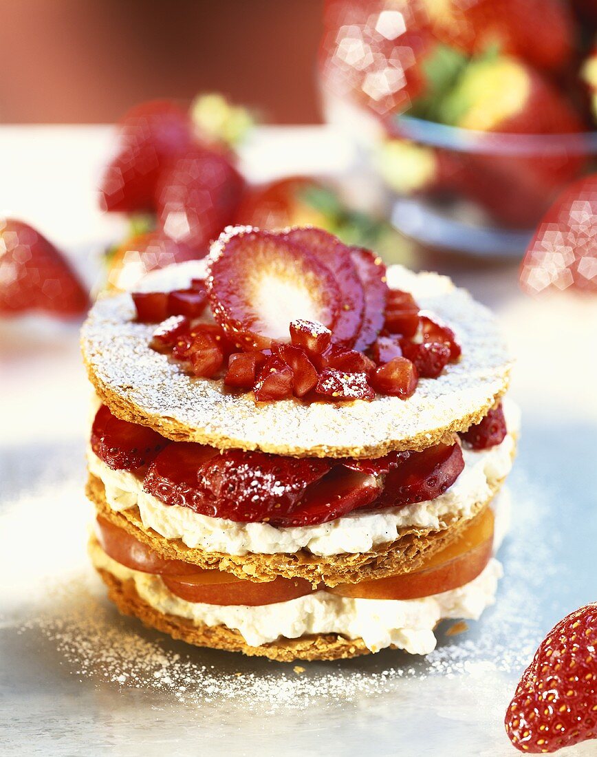 Millefeuille filled with strawberries, apple & whipped cream