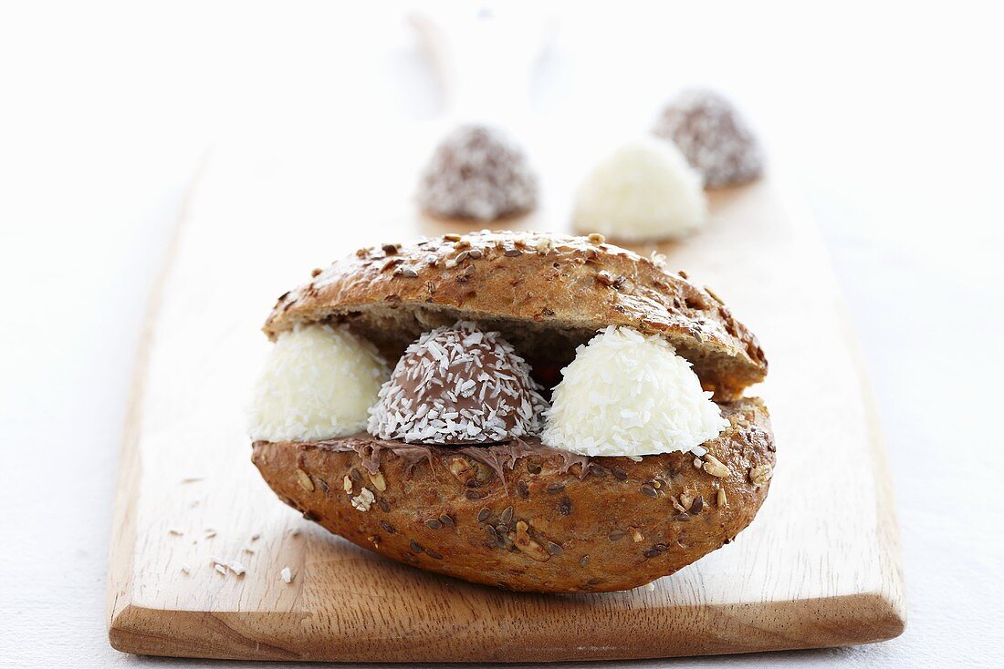 A bread roll filled with coconut sweets