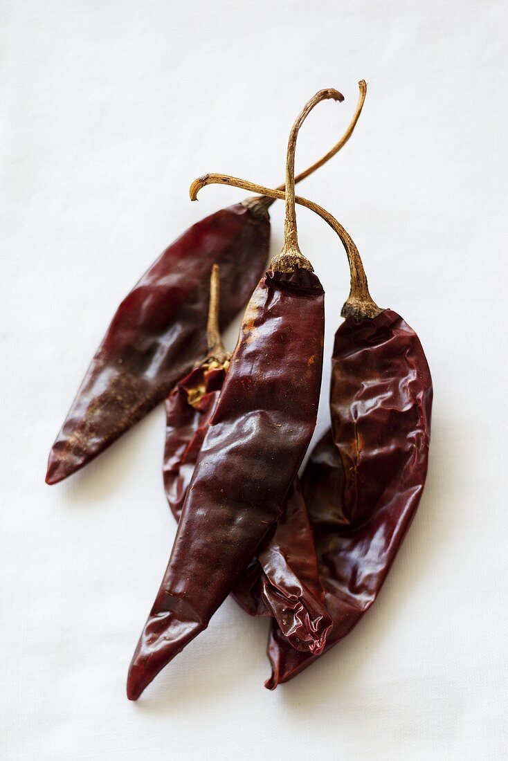 Several dried chilli peppers
