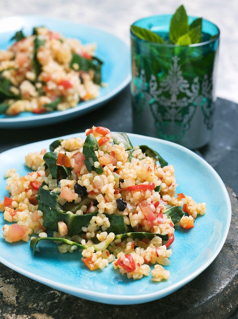 Bulgar pilaw with tomatoes and chard (Turkey)