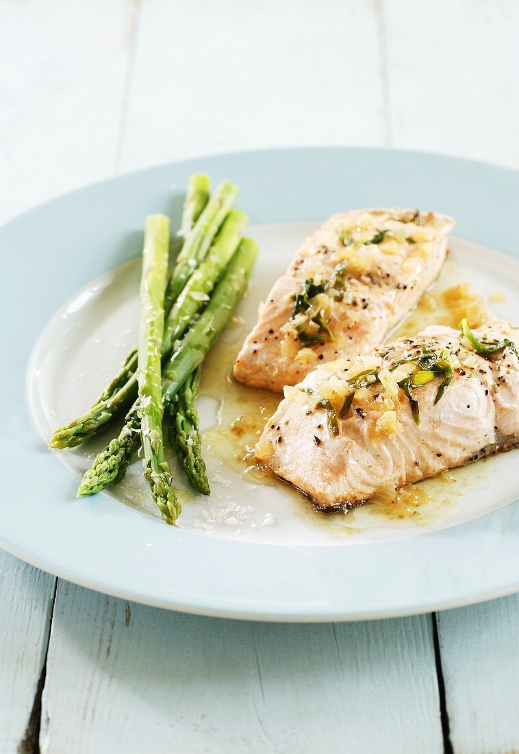 Poached salmon fillet with green asparagus