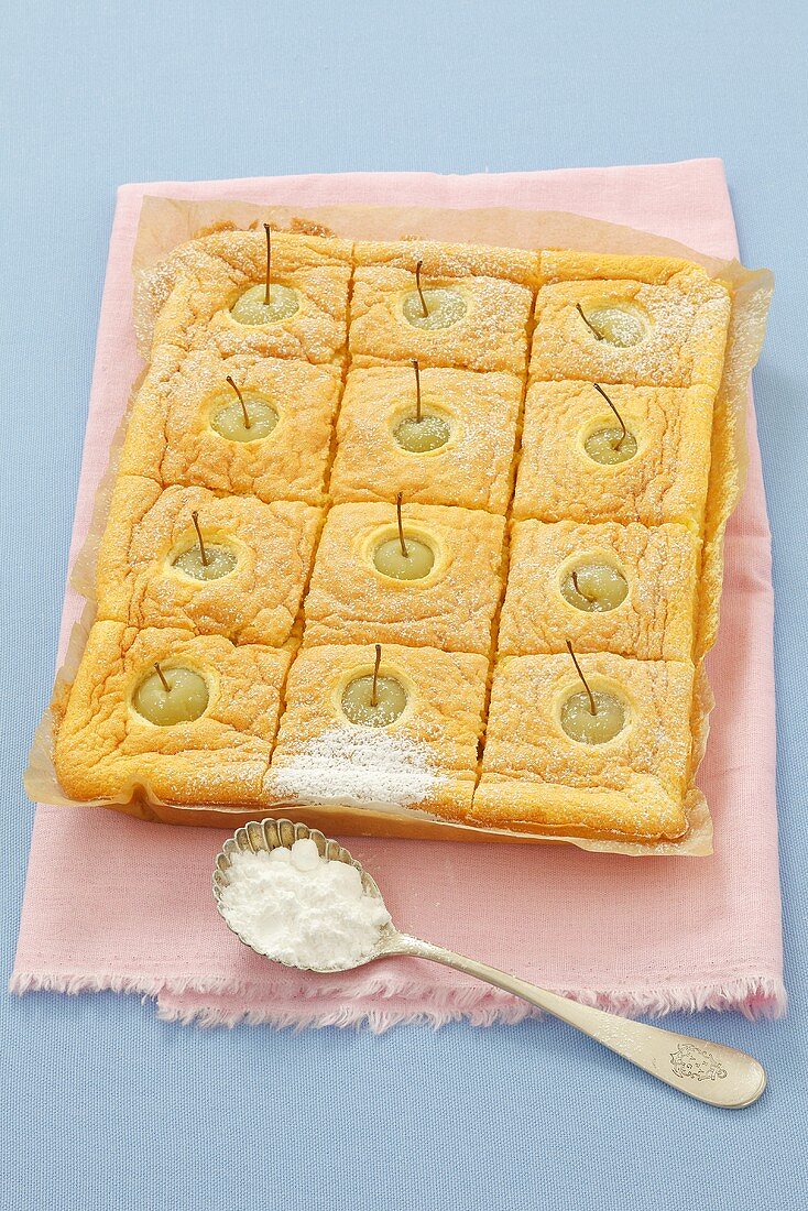 Sponge tray bake with small apples