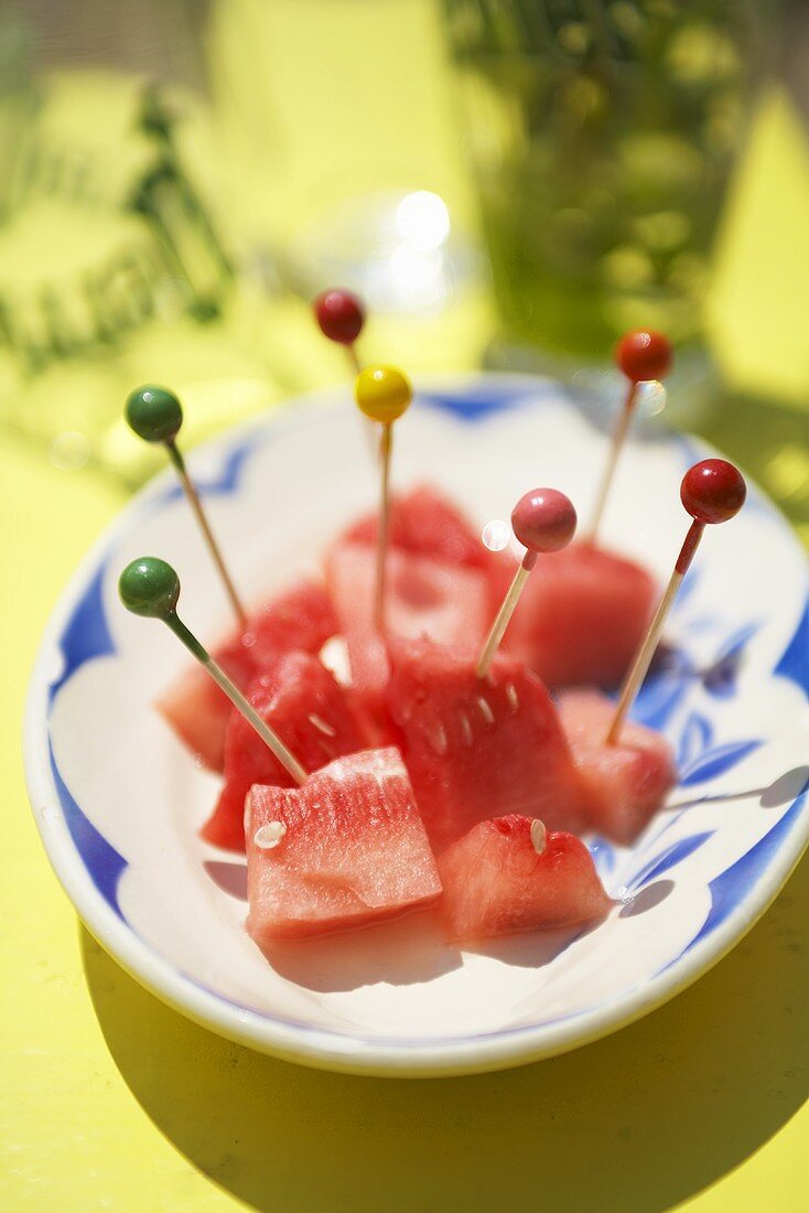Pieces of watermelon on cocktail sticks