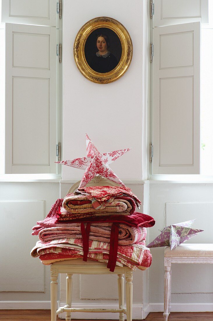 Christmas blankets and paper stars as presents