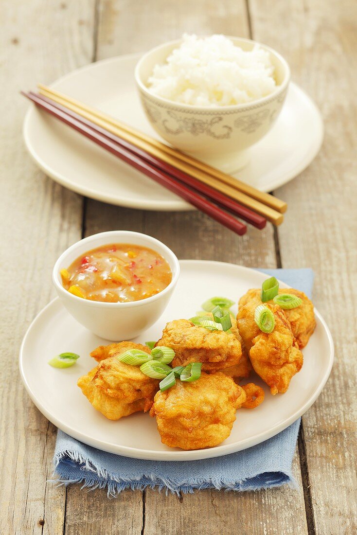 Deep-fried pork with a sweet and sour sauce and rice