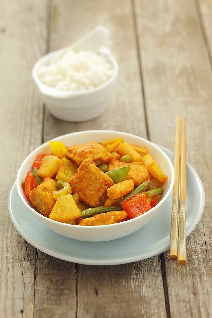Sweet and sour pork with pineapple, vegetables and rice