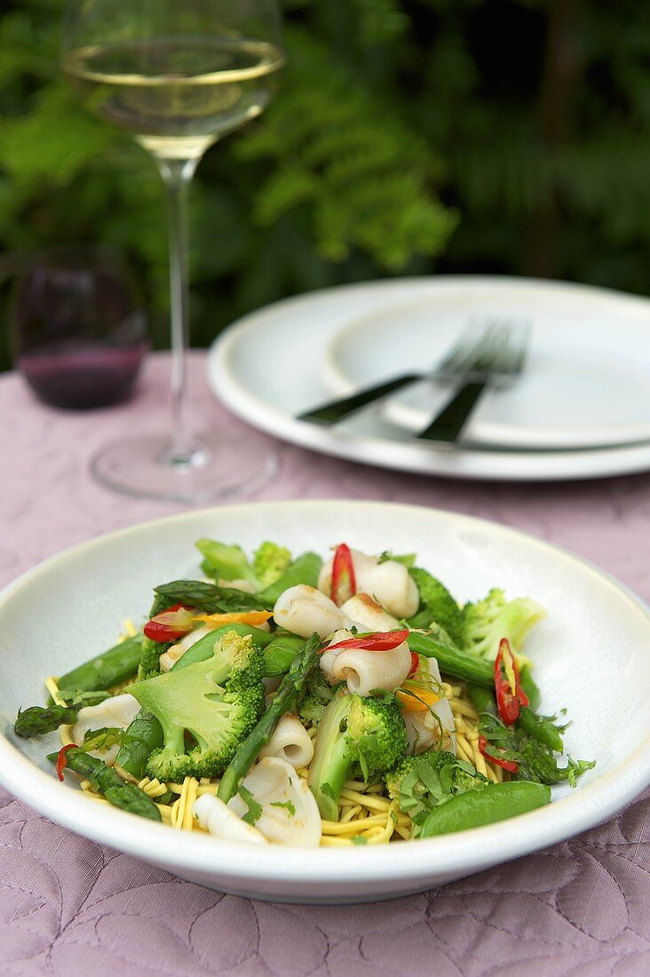 Pasta with vegetables, squid and ginger