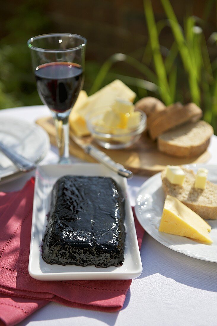 Blackcurrant jam, cheese and bread