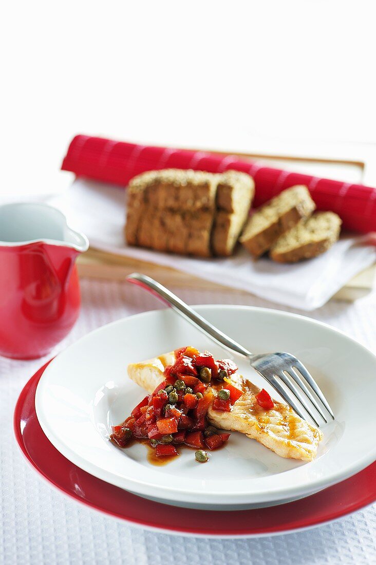 Fillet of fish with a pepper salsa