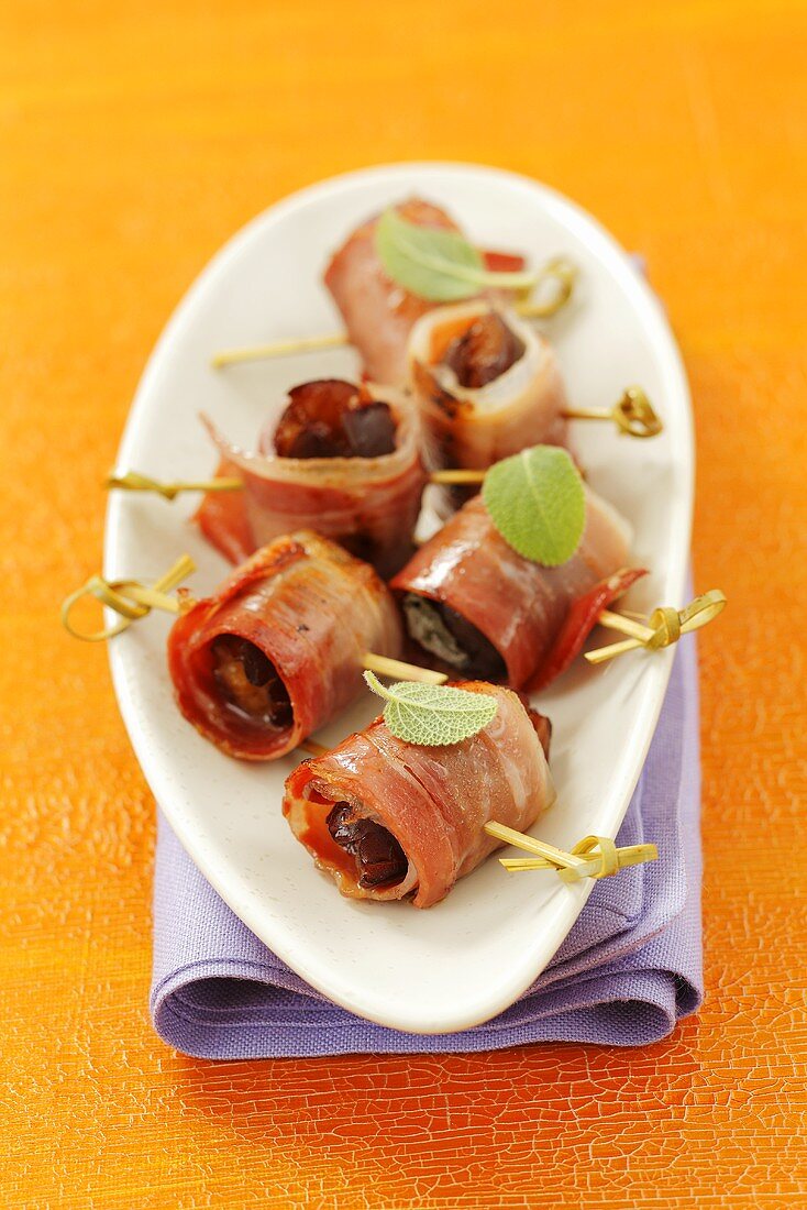 Fried plums wrapped in bacon
