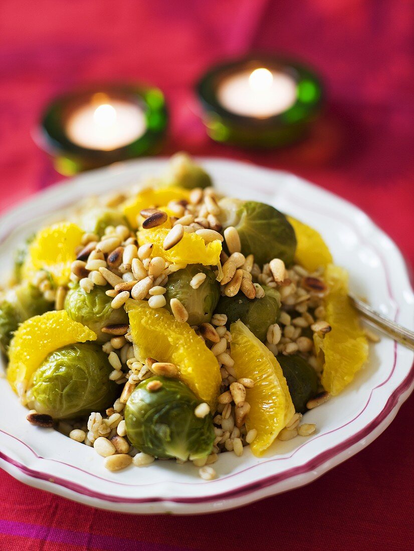 Soft wheat salad with Brussels sprouts, oranges and pine nuts