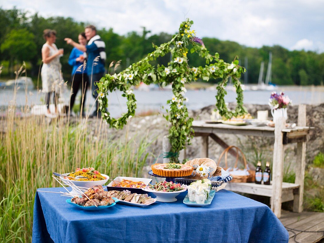 A mid-summer buffet by a lake (Sweden)