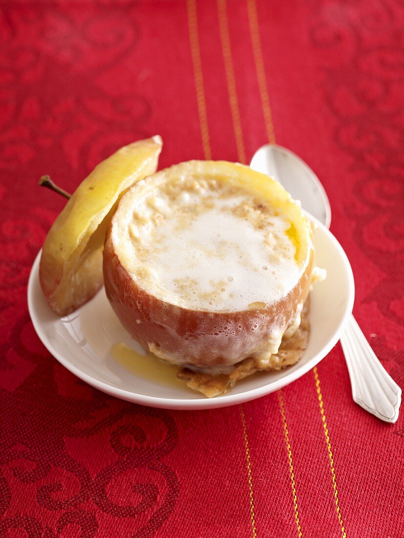 A baked apple with a marshmallow filling