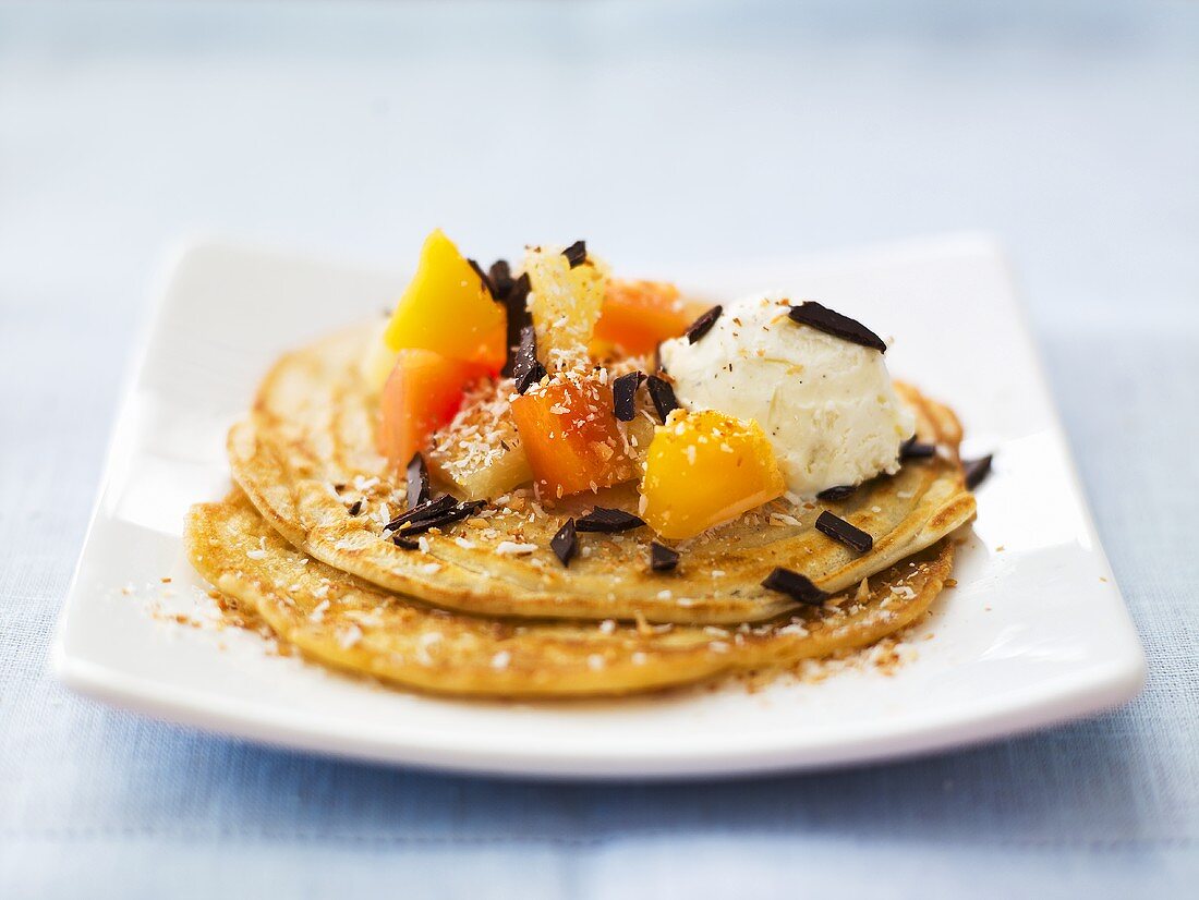 Coconut pancakes with exotic fruit salad
