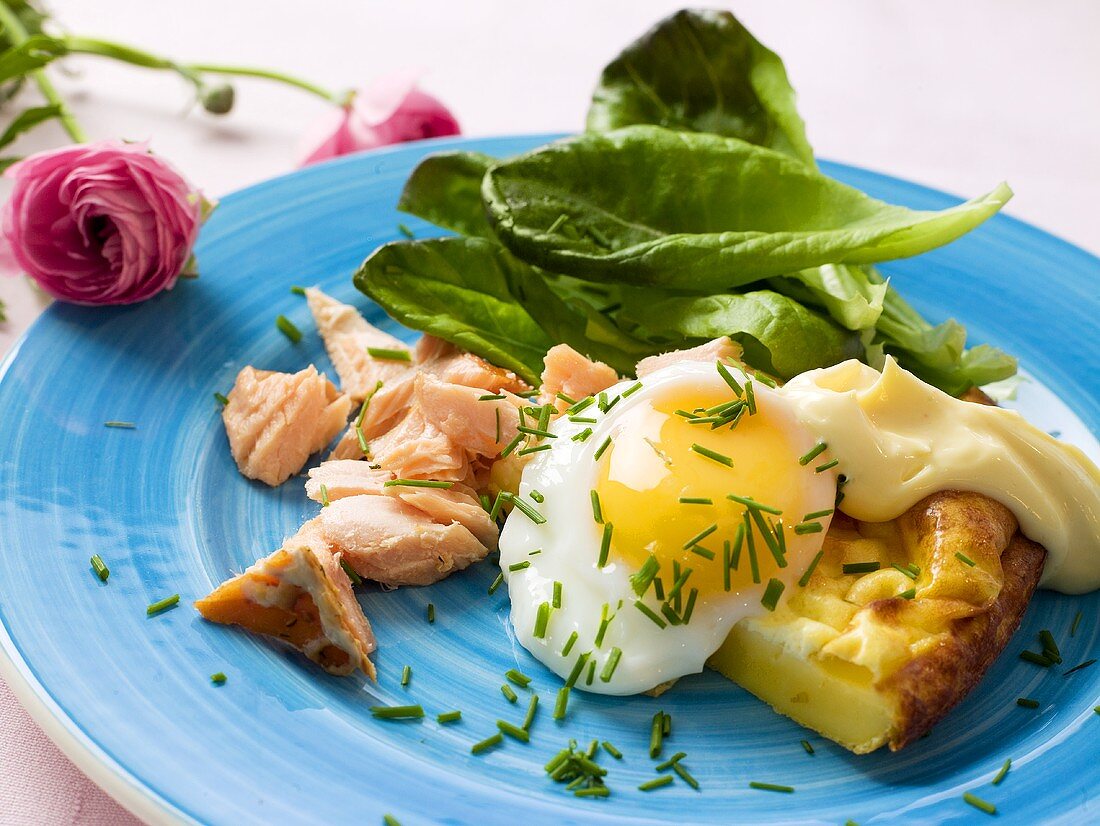 Chickpea pancake with egg and salmon