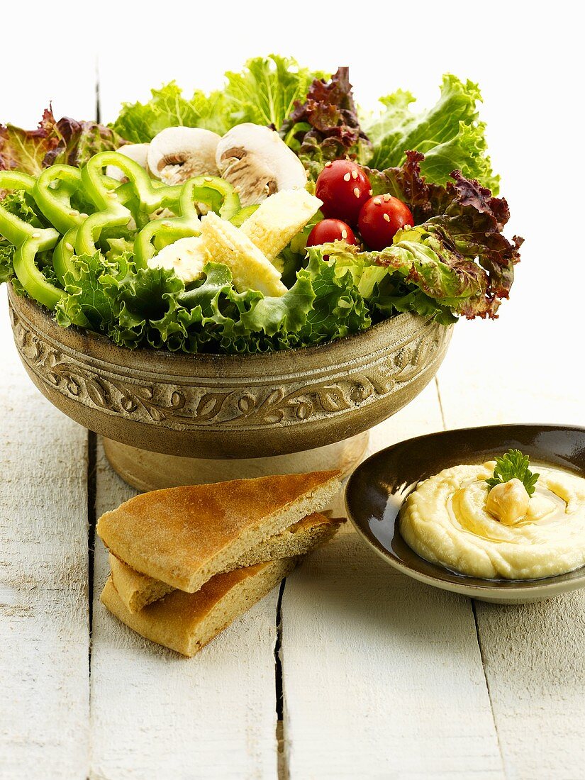 Salad, flatbread and hummus (Lebanon)