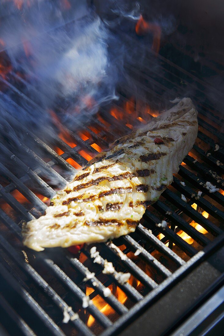 A fillet of fish on the barbeque
