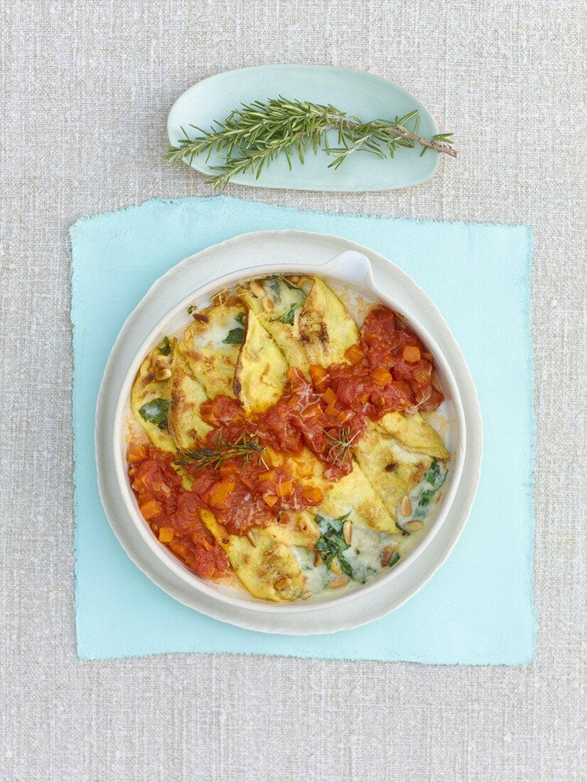 Crespelle with Gorgonzola, tomatoes and rosemary