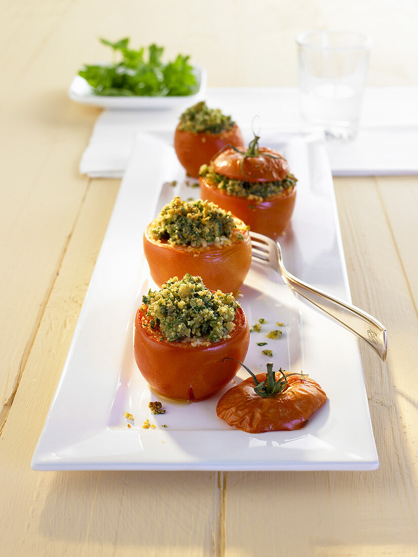 Baked tomatoes with herb stuffing