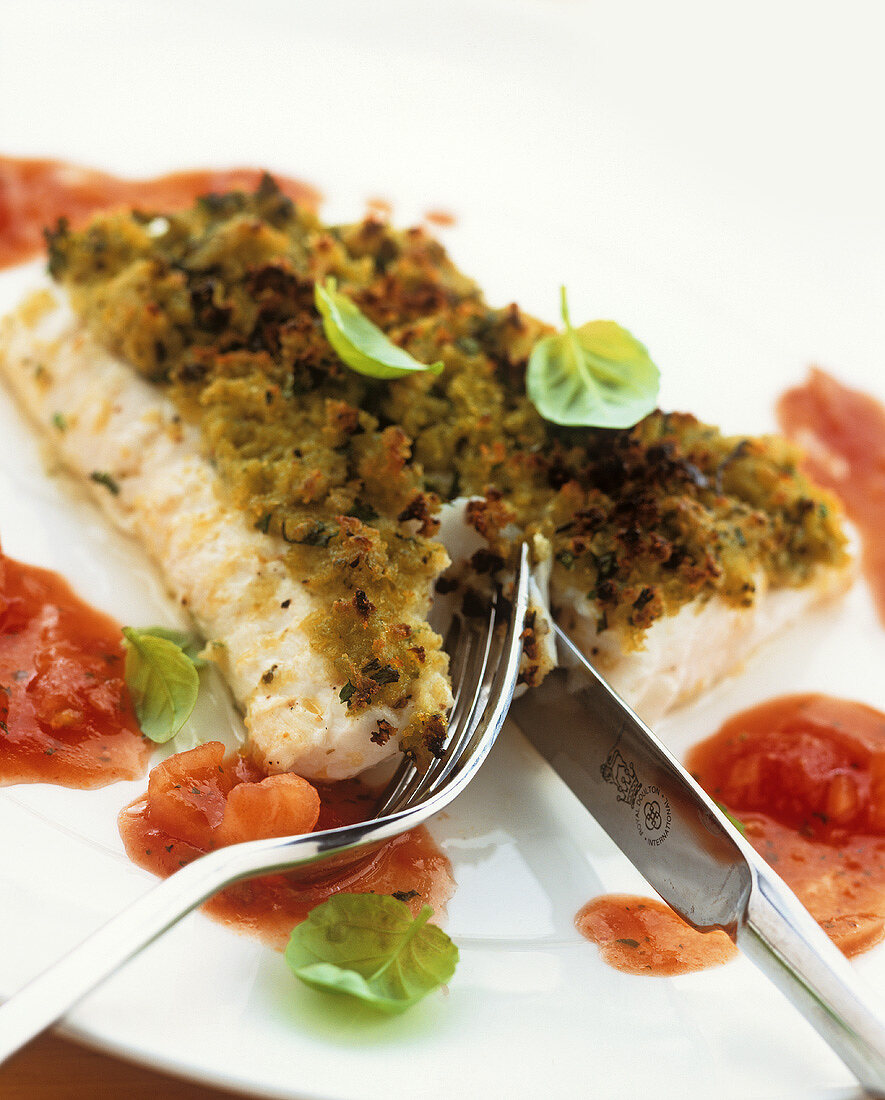 Cod fillet with herb crust and tomato sauce