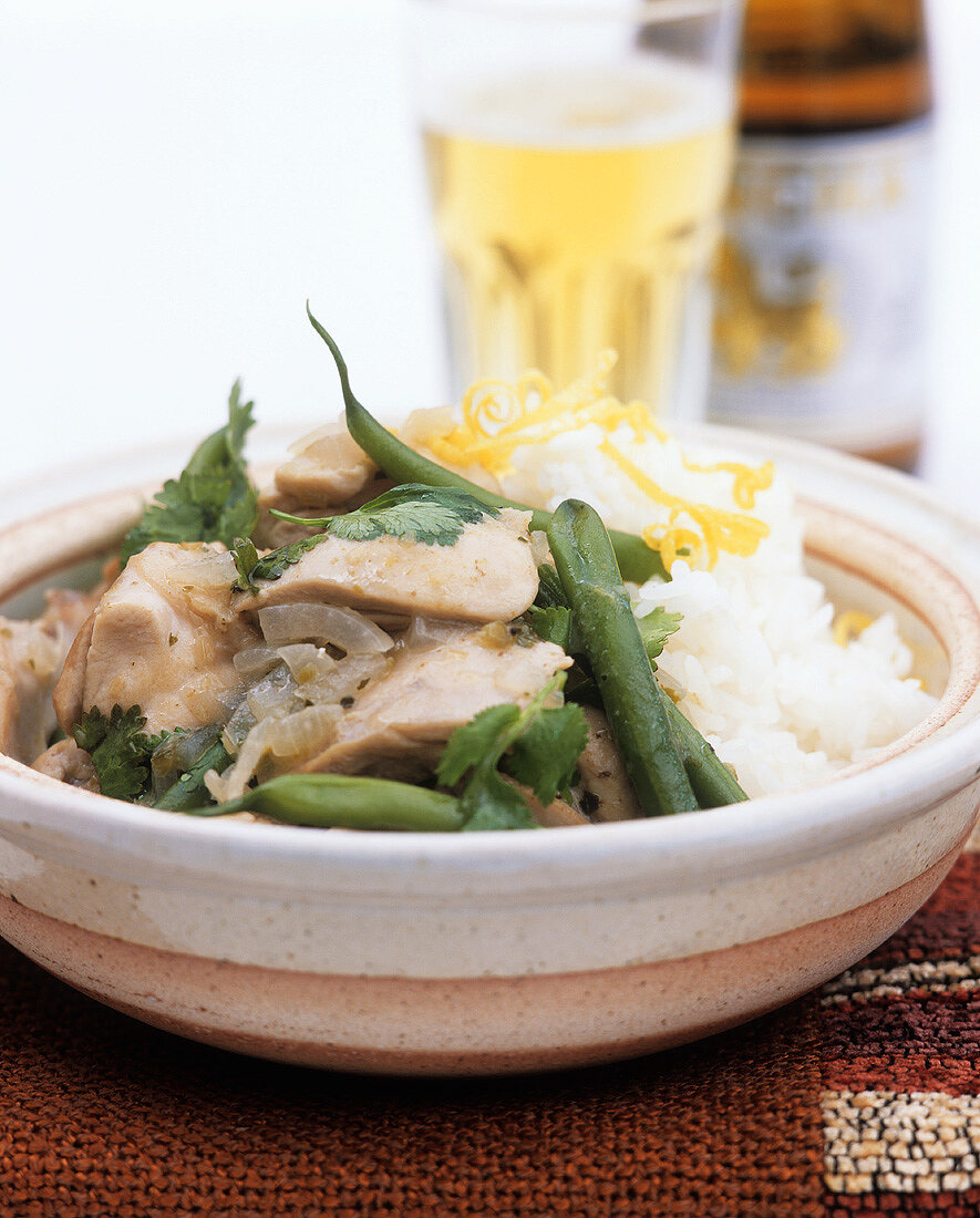 Chicken curry with coconut sauce, coriander and rice