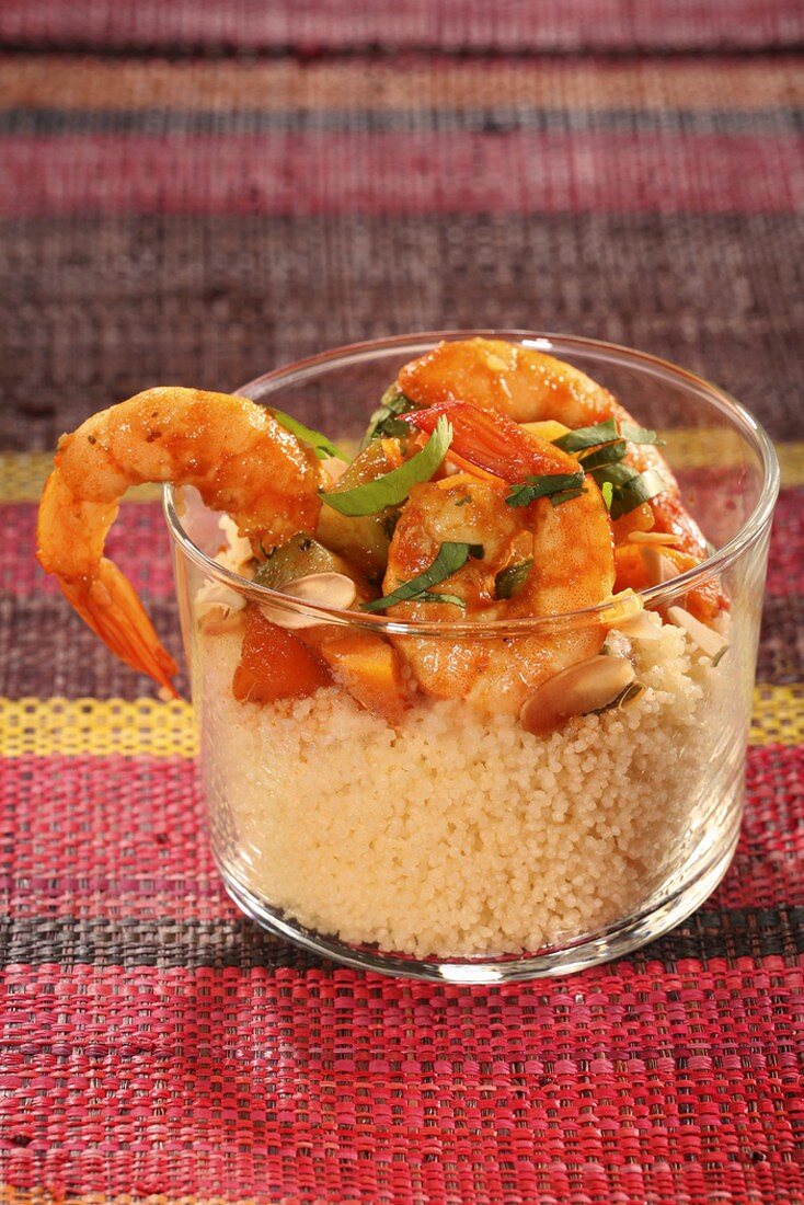 Prawns on couscous with vegetables and almonds