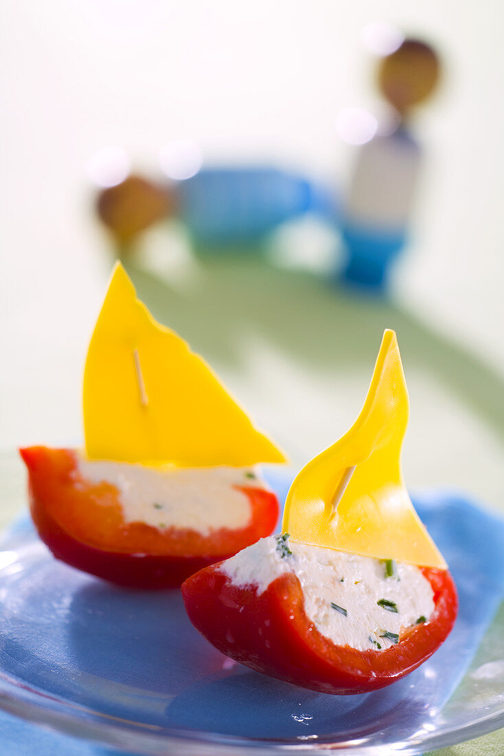 Pepper boats with cheese sails, filled with herb quark